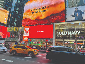 photograph of economist billboard displaying the words